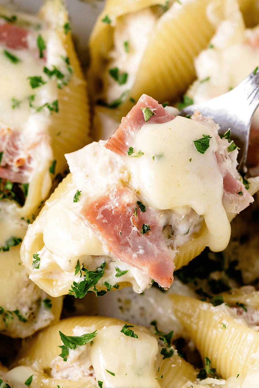 Prosciutto-Wrapped Chicken Stuffed Shells with Brie Sauce