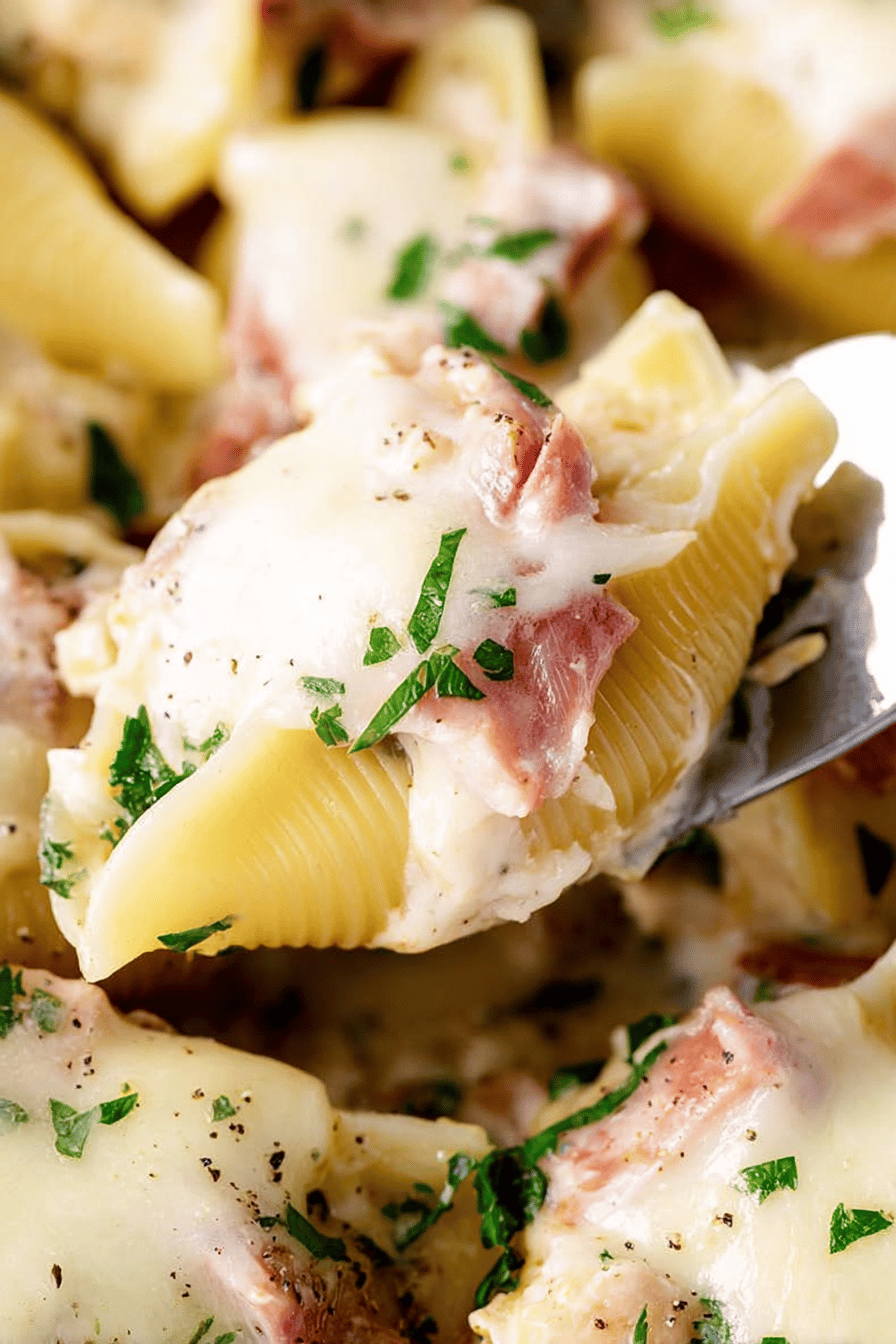 Prosciutto-Wrapped Chicken Stuffed Shells with Brie Sauce