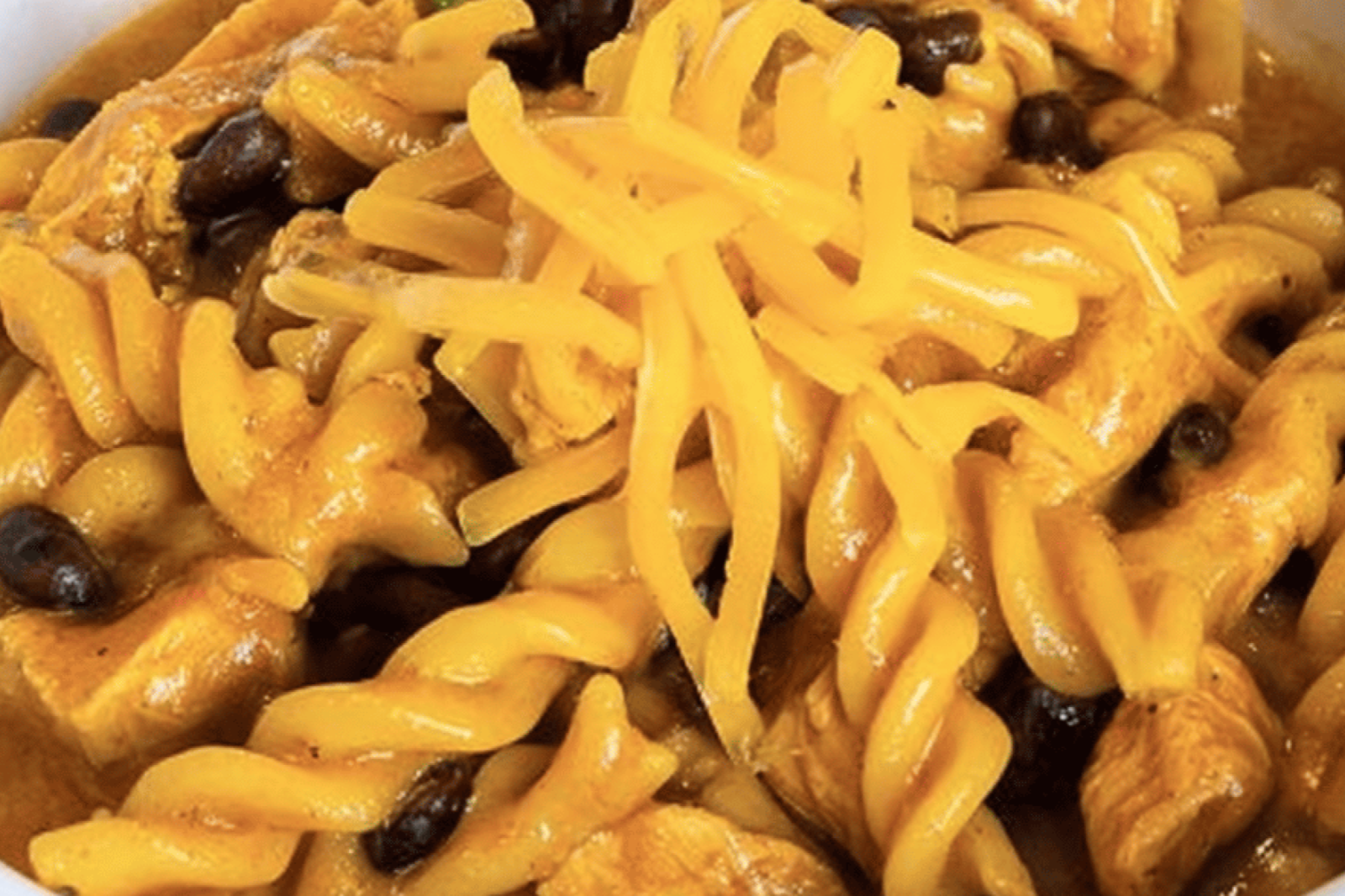 Quick Cheesy Instant Pot Chicken Enchilada Pasta