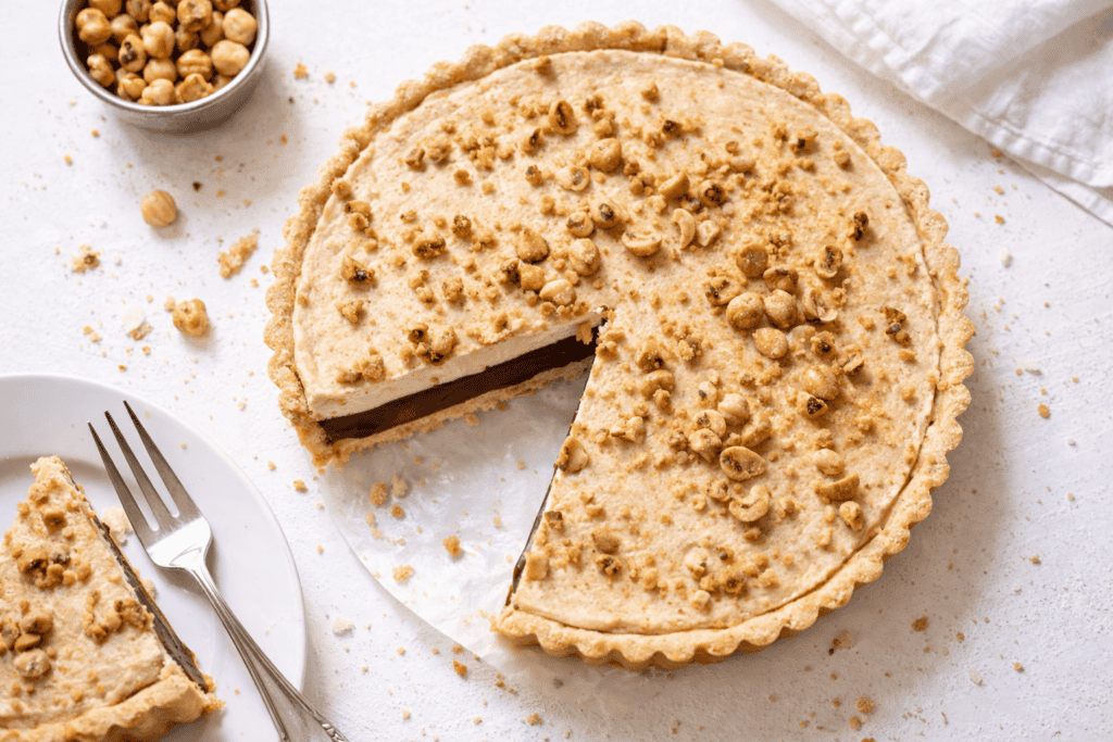 Delicious hazelnut chocolate pie with a crumbly crust and creamy filling, perfect for dessert or spe.