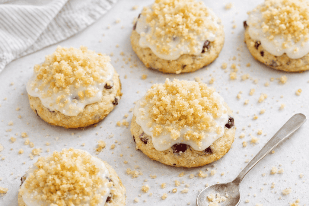 Berry cookies with lemon glaze and crumb topping, perfect for dessert or tea time.
