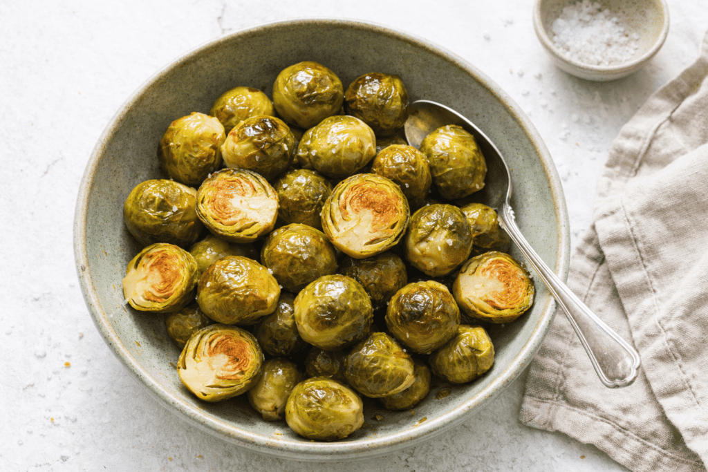 Delicious roasted Brussels sprouts in a bowl, perfect for healthy side dishes.